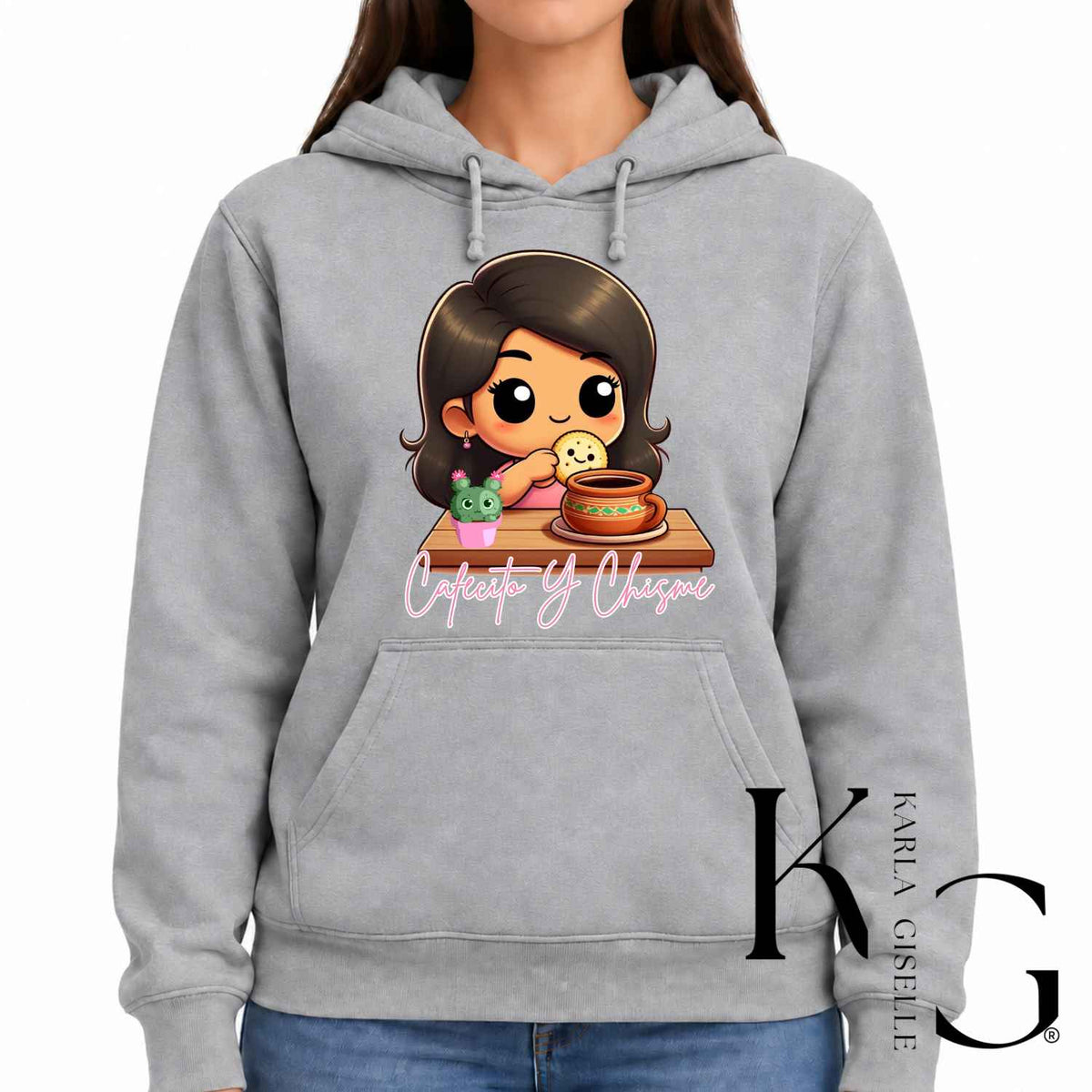 Cafecito y Chisme graphic on a gray hoodie