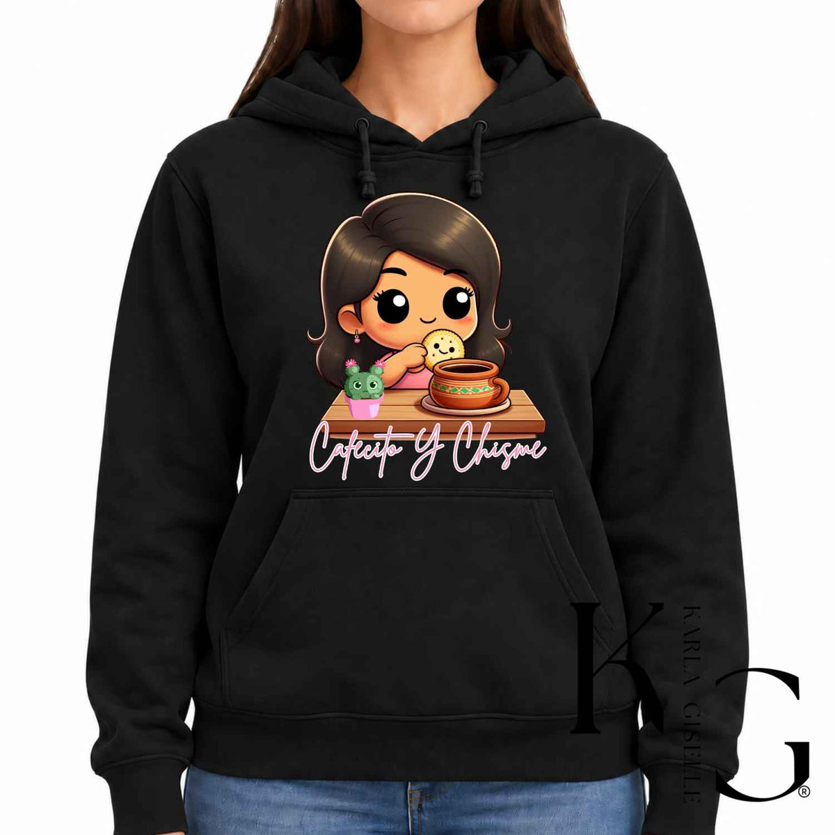 Cafecito y Chisme graphic on a black hoodie