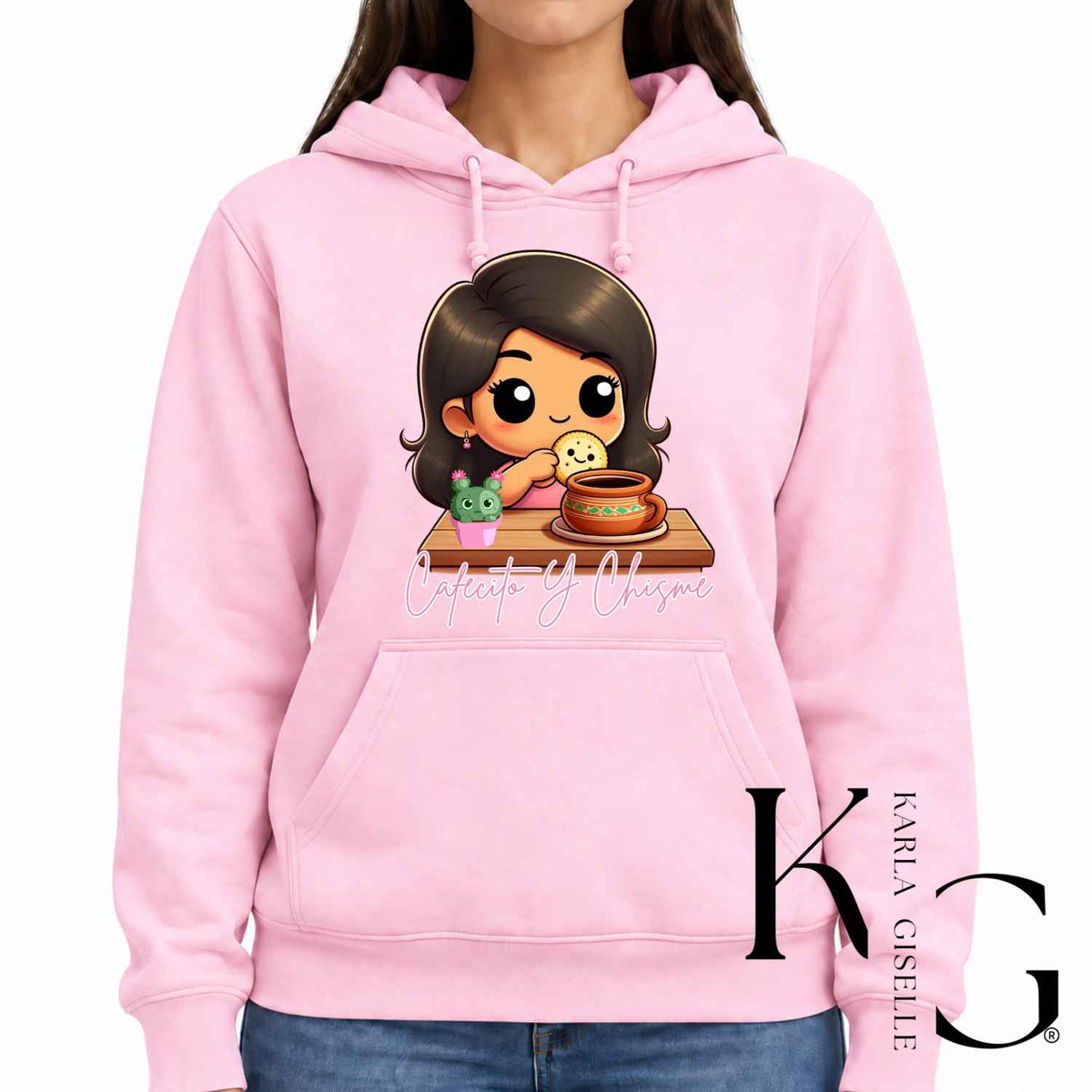 Cafecito y Chisme graphic on a pink hoodie