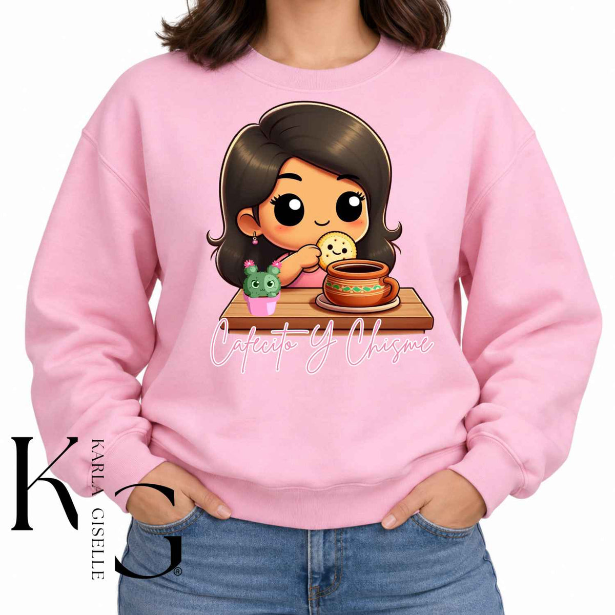 Cafecito y Chisme graphic on a pink crewneck sweatshirt