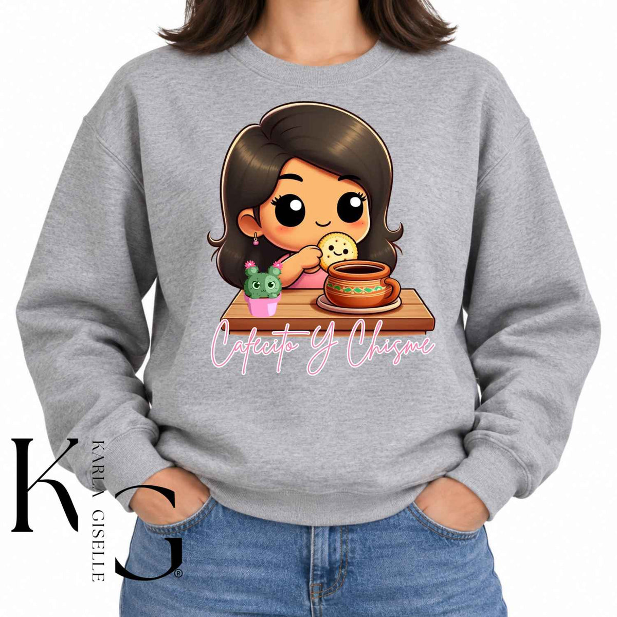 Cafecito y Chisme graphic on a gray crewneck sweatshirt