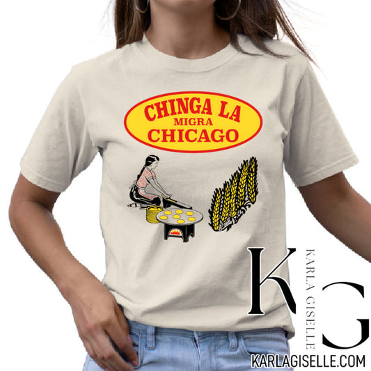 Chinga La Migra Chicago graphic on a light neutral T-shirt