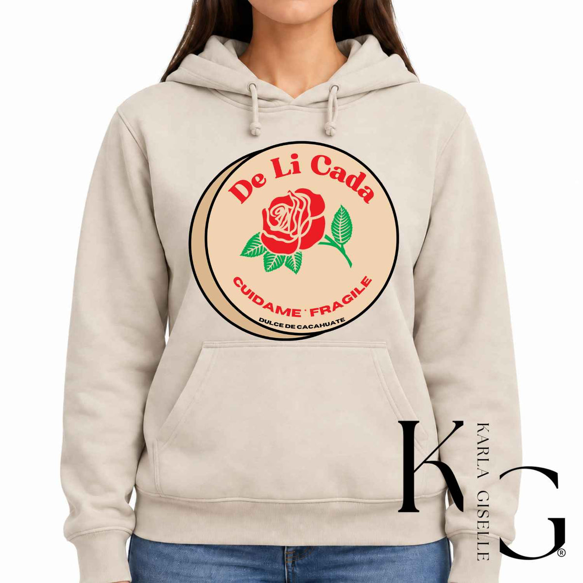 Cream hoodie with Delicada graphic